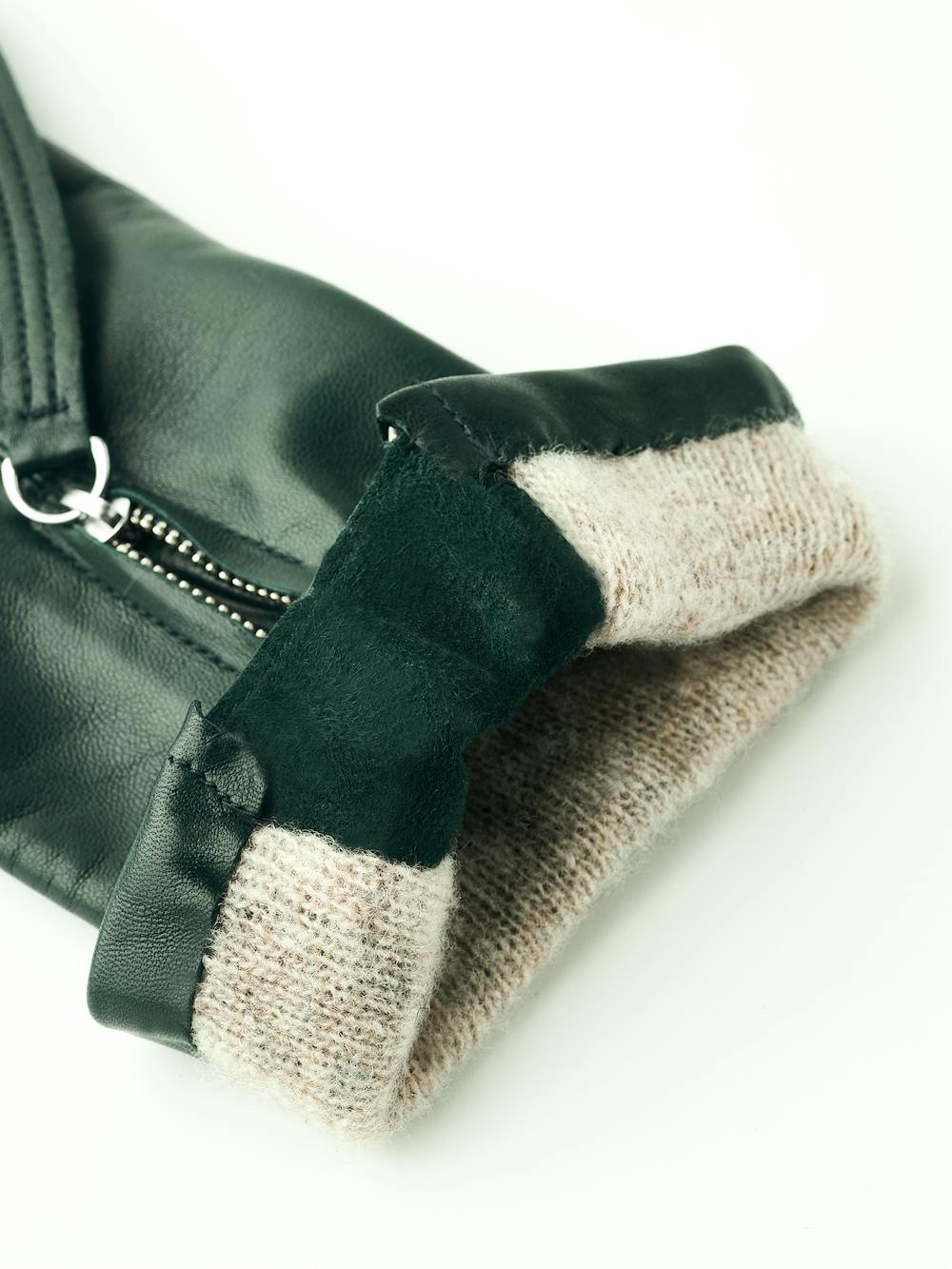 Dark green machine-sewn hairsheep leather glove with zip
(6 of 6)
