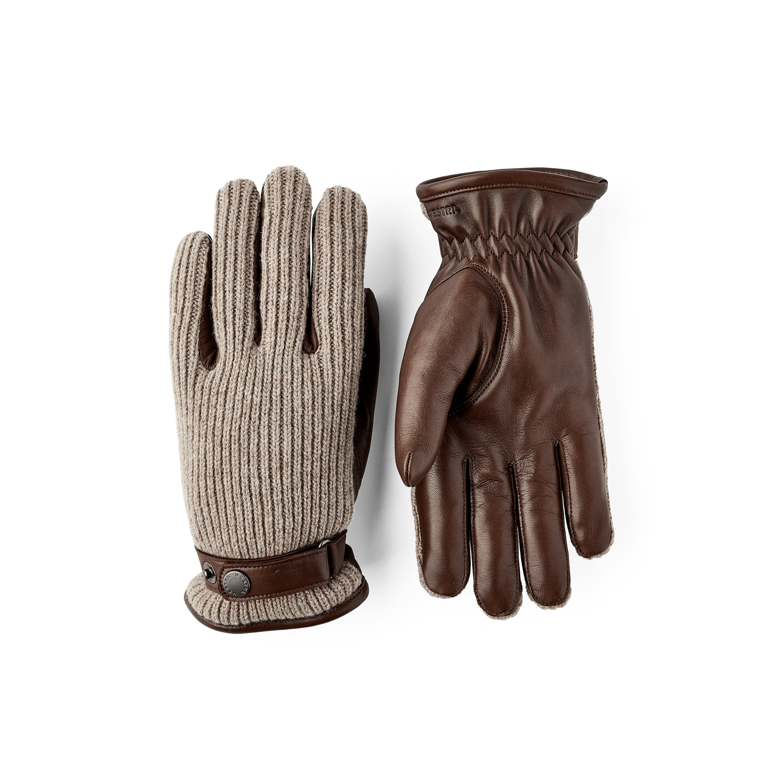 Ljusbrun maskinsydd handske i lammnappa med beige ribbstickad backhand i ull
(1 av 5)