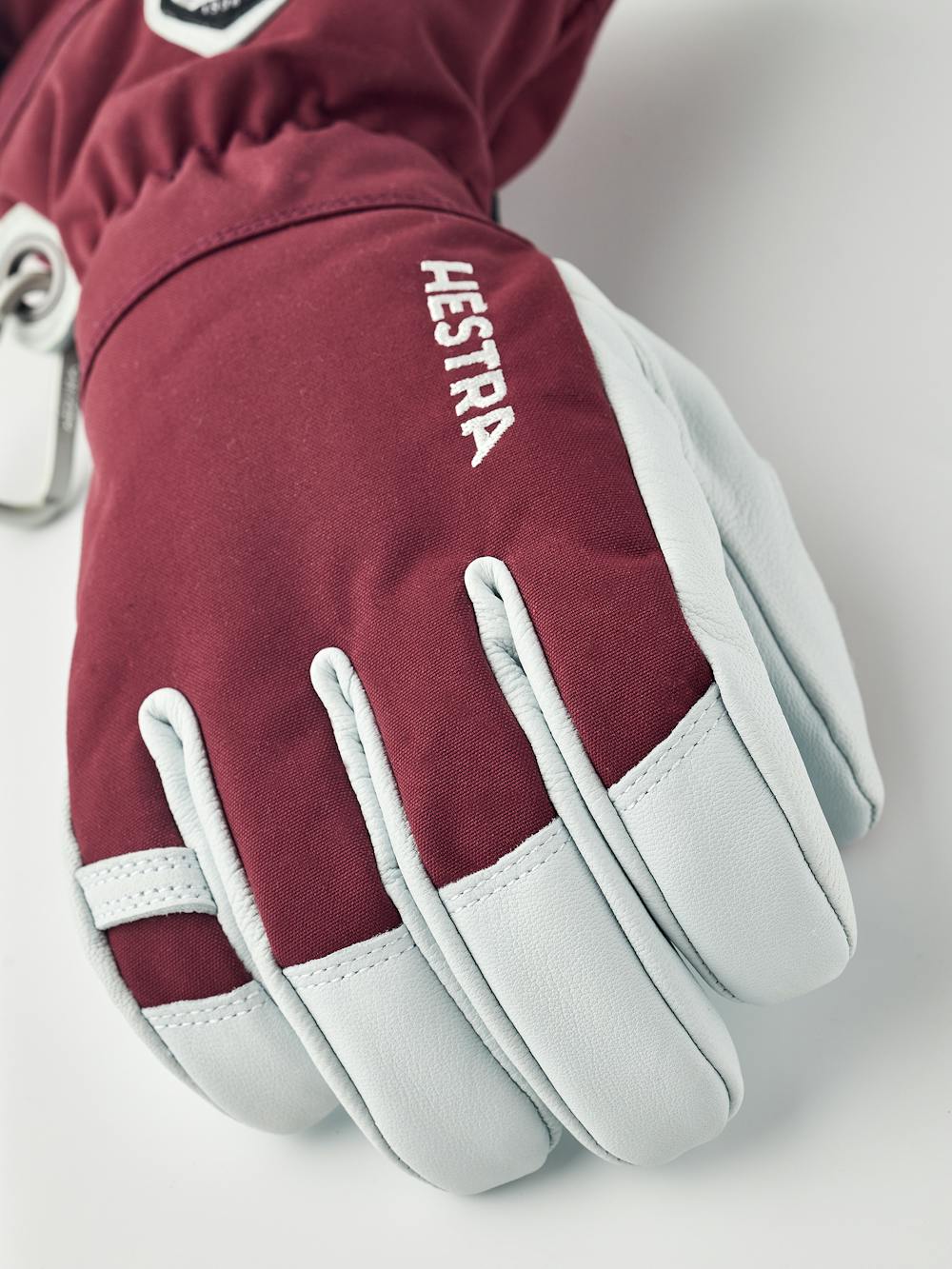 Bordeauxroter Skihandschuh mit weißem Ziegenleder an der Innenhand
 (3 oder 8)