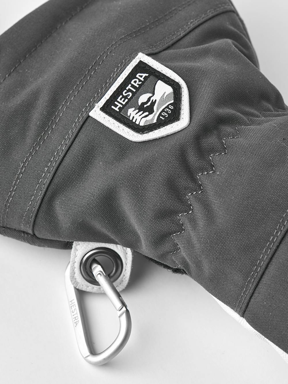 Grauer Skihandschuh mit weißem Ziegenleder an der Innenhand
 (5 oder 7)