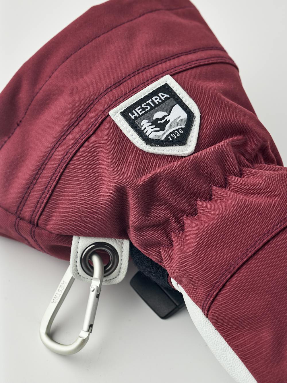 Bordeauxroter Skihandschuh mit weißem Ziegenleder an der Innenhand
 (5 oder 8)