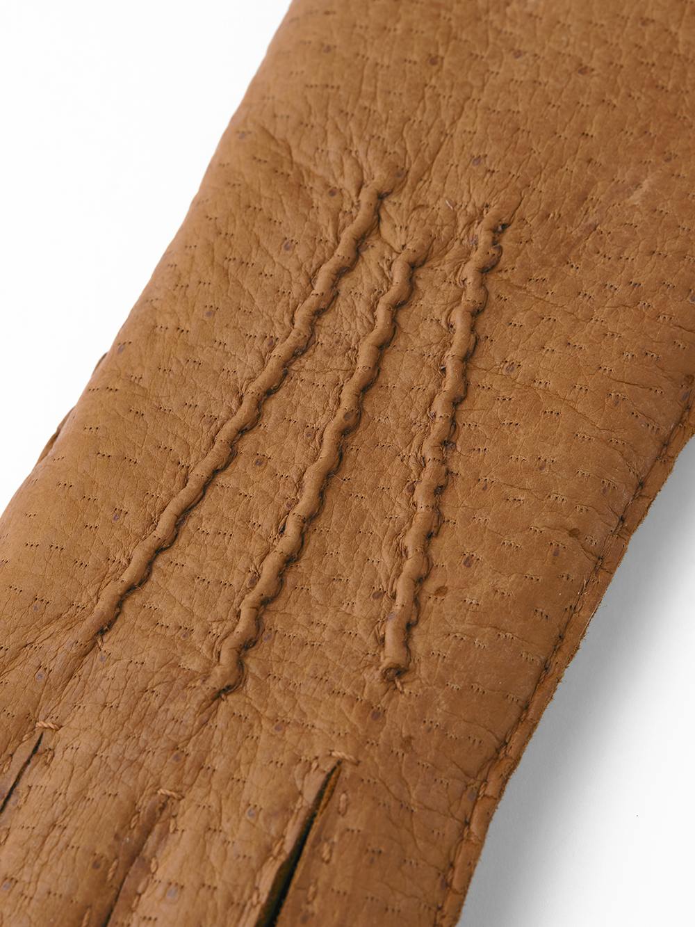 Ljusbrun handsydd skinnhandske i peccary
 (2 av 3)