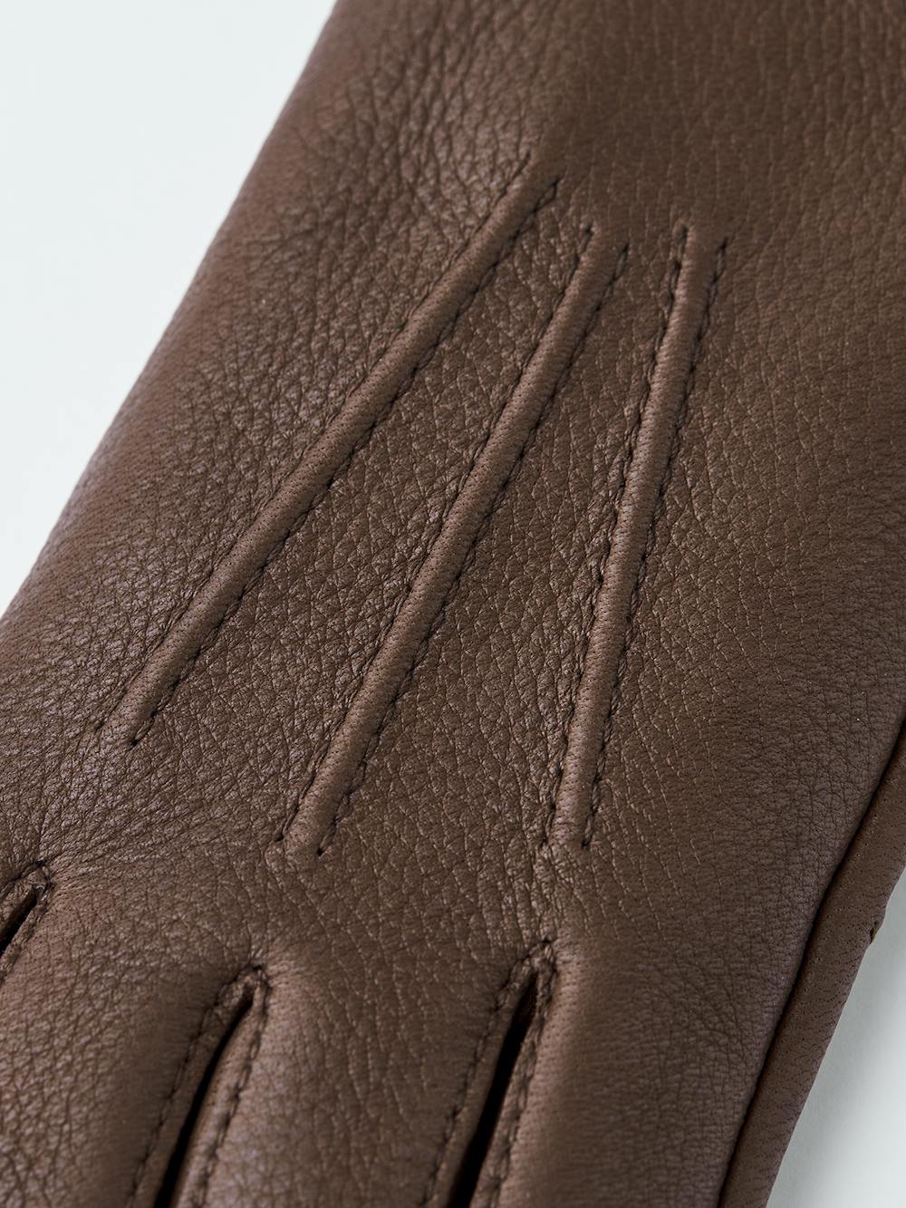 Brown machine-sewn deerskin glove
(4 of 6)