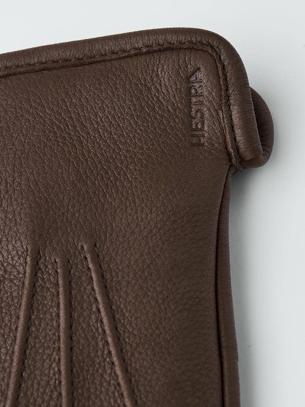 Brown machine-sewn deerskin glove
 (2 of 6)