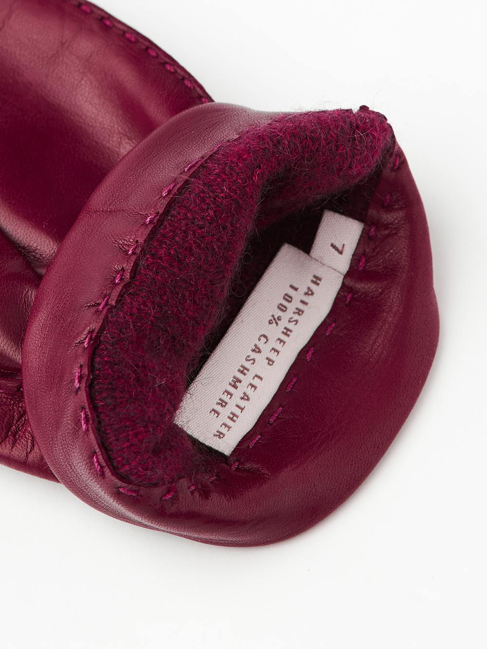 Dark red handsewn glove in hairsheep leather.
(3 of 3)