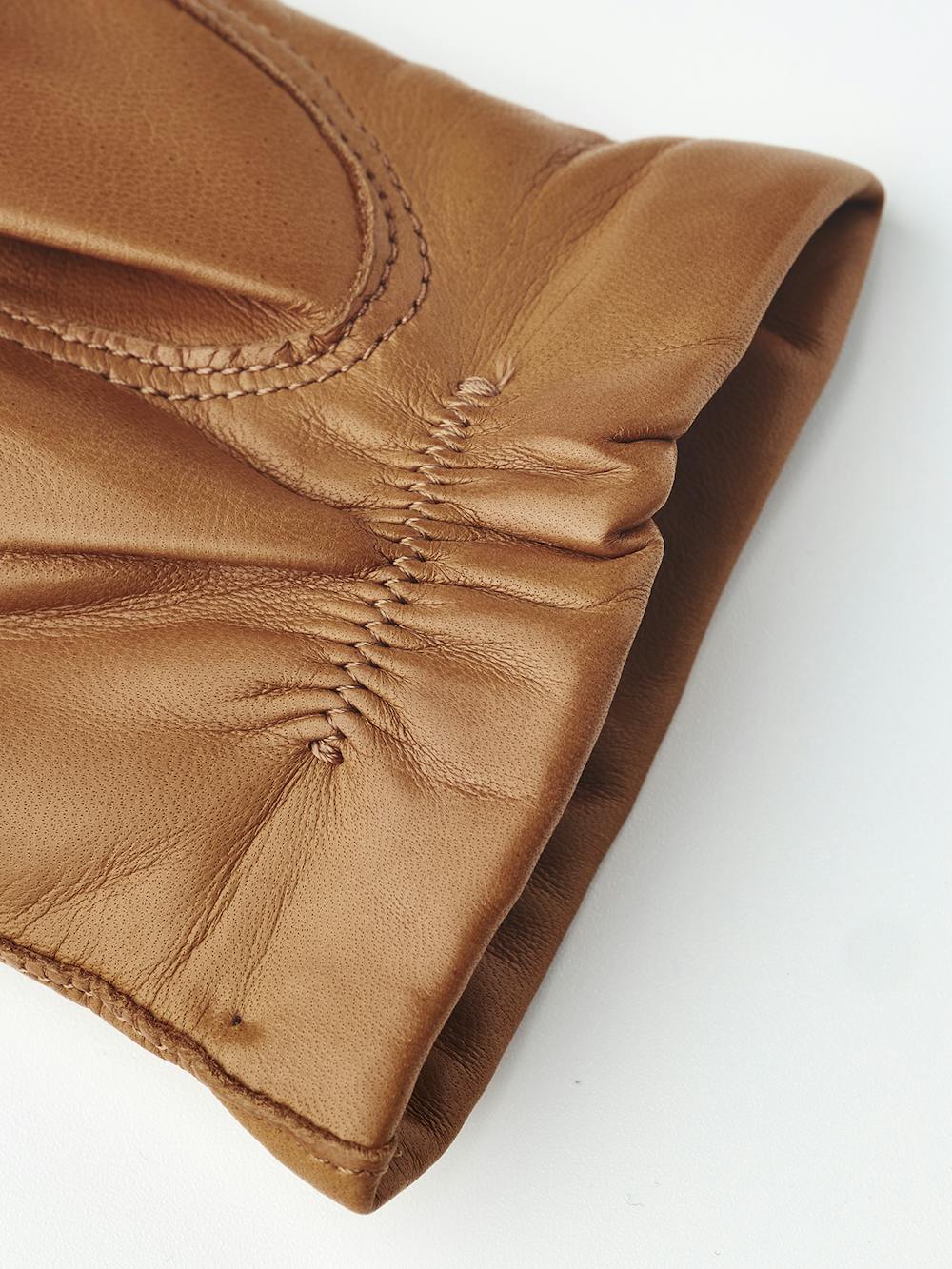 Light brownish-yellow machine-sewn hairsheep leather glove
(2 of 3)