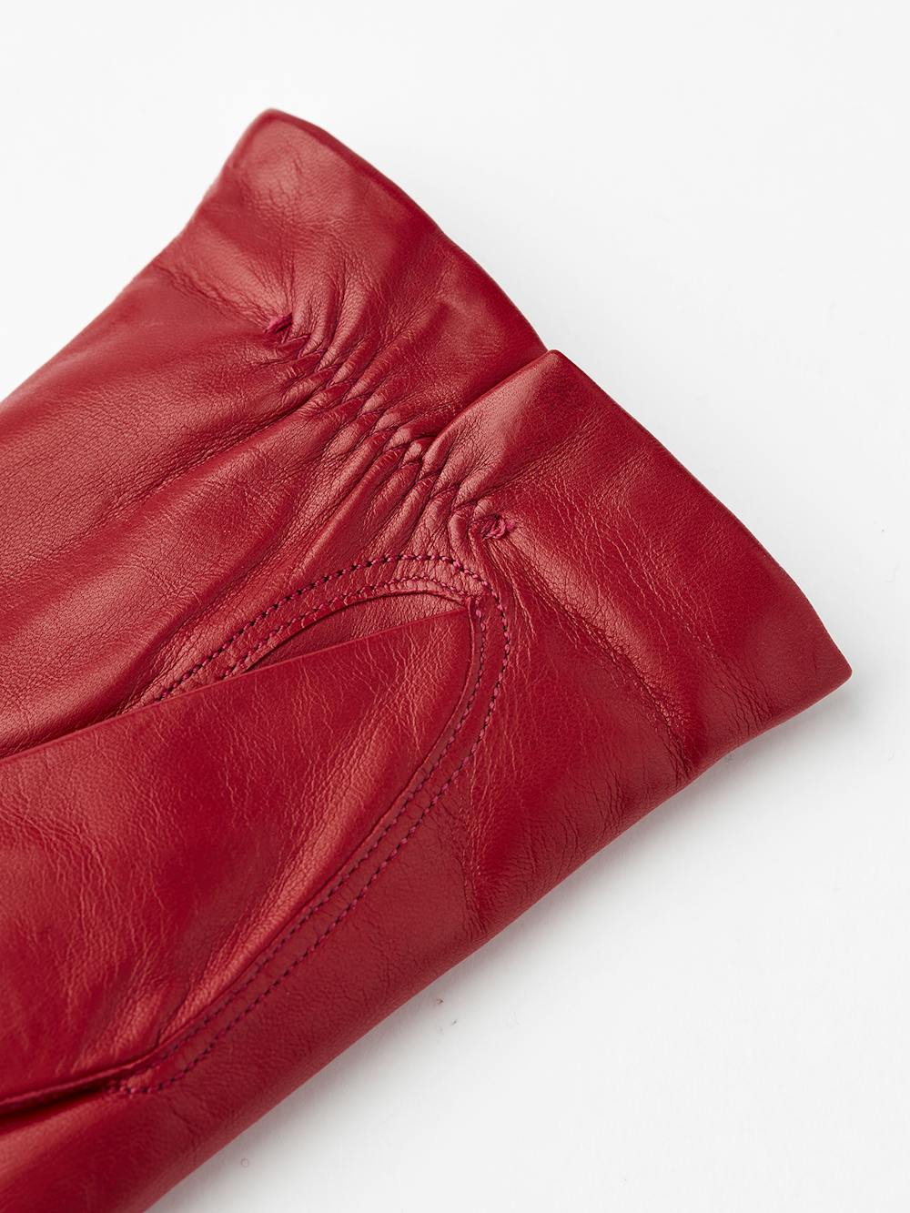 Dark red machine-sewn hairsheep leather glove
(2 of 3)