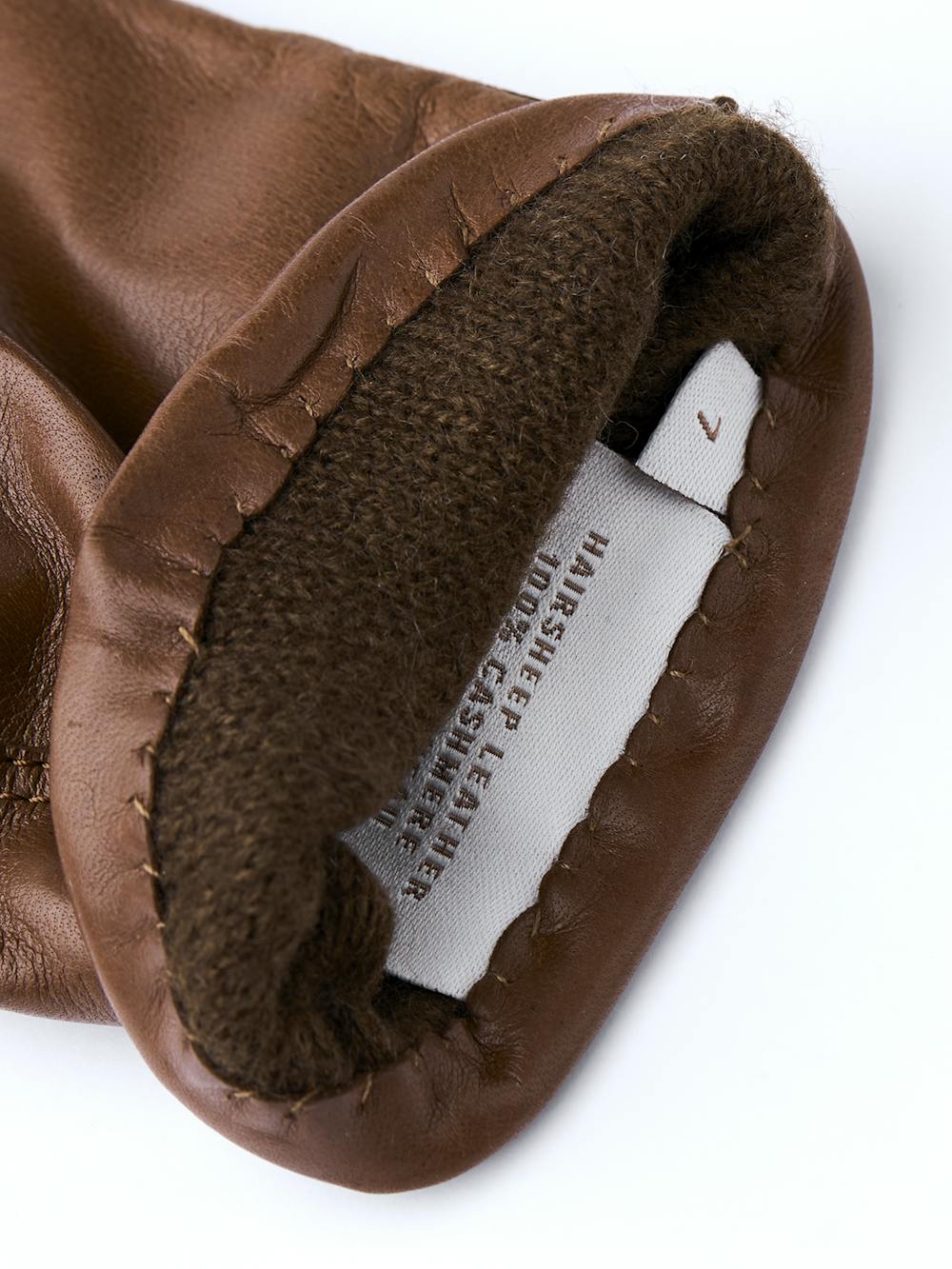 Mittelbrauner maschinengenähter Lederhandschuh aus Haarschafleder
(3 oder 3)