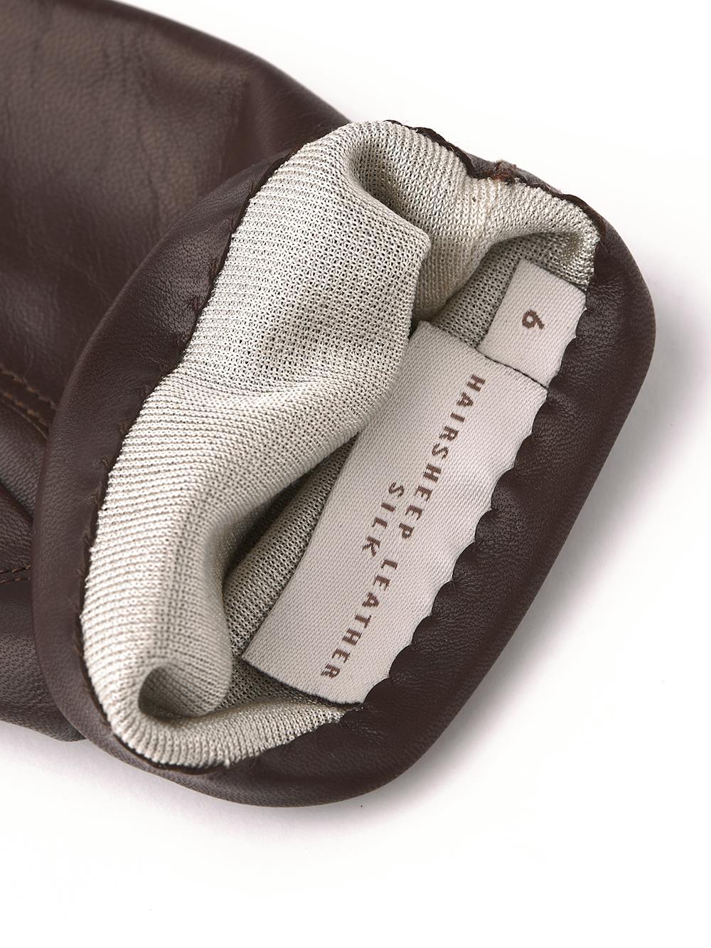 Brown machine-sewn hairsheep leather glove
(2 of 2)