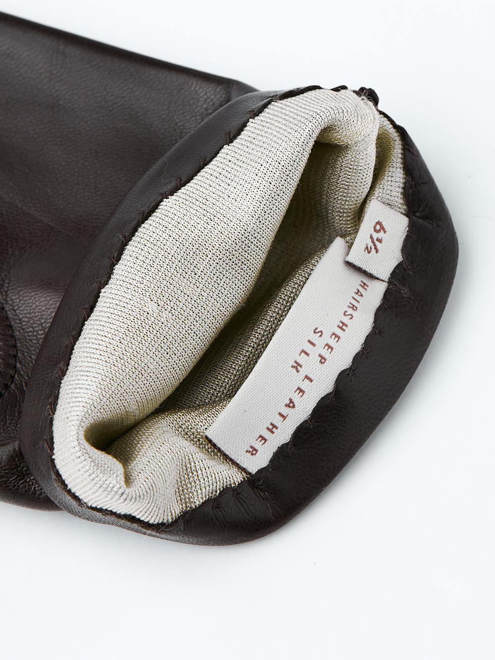 Dark brown machine-sewn hairsheep leather glove
(2 of 2)