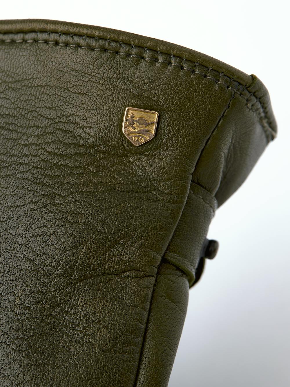 Loden green machine-sewn hairsheep leather glove with leather strap
 (2 of 3)