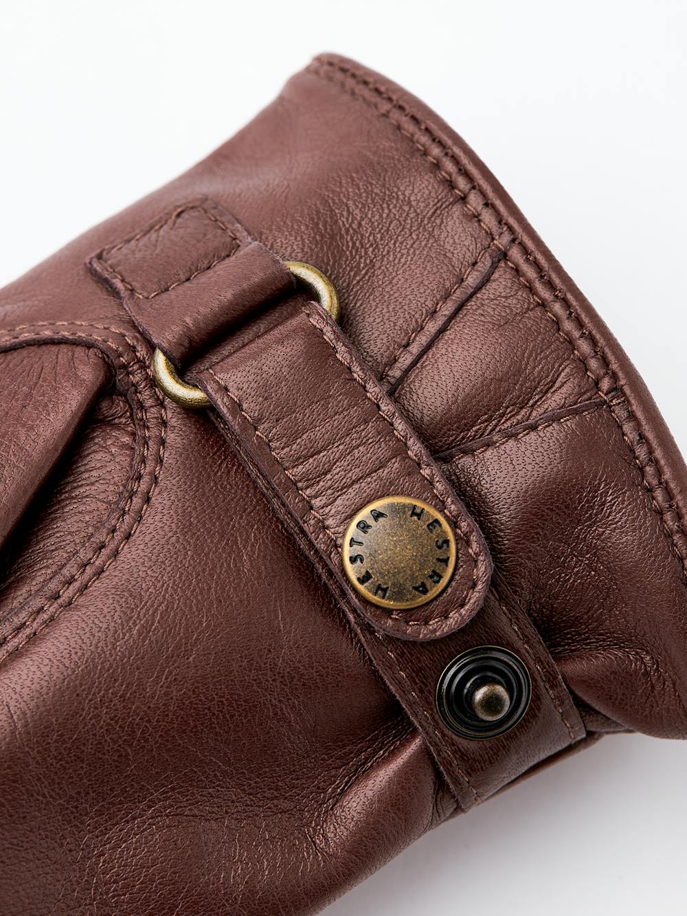 Brown machine-sewn hairsheep leather glove with leather strap
 (3 of 3)