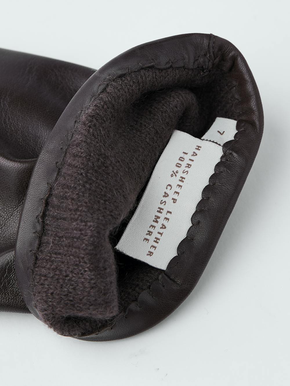 Dunkelbrauner maschinengenähter Lederhandschuh aus Haarschafleder
 (2 oder 2)