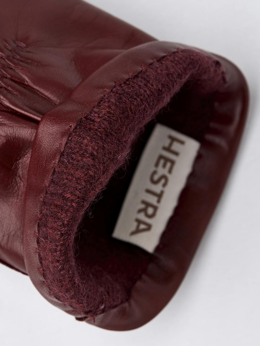 Dark red machine-sewn hairsheep leather glove
(3 of 4)