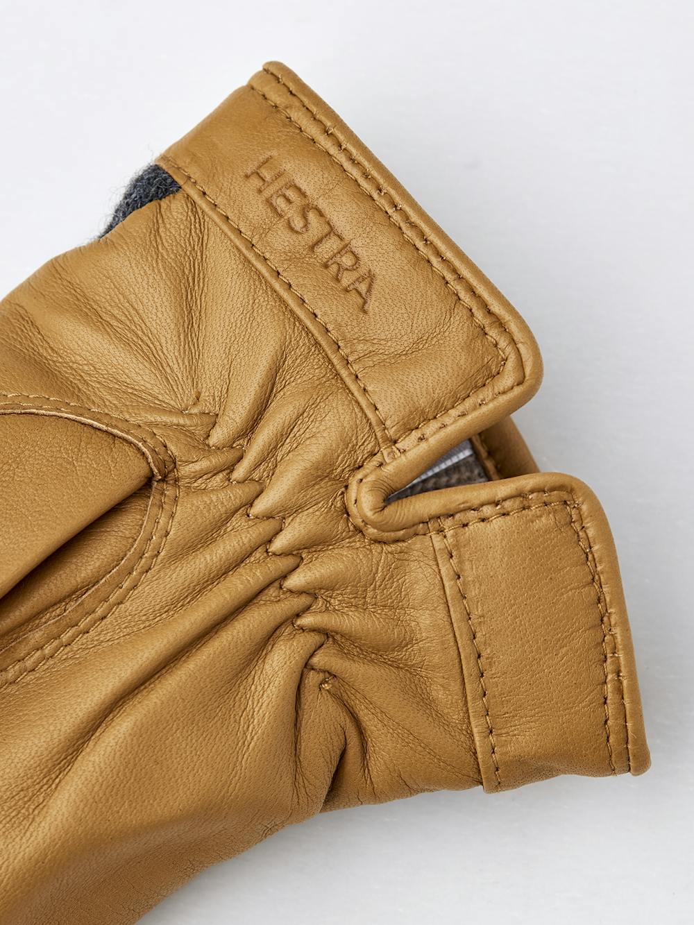 Dark beige hairsheep leather glove with knitted gray wool jersey back
(3 of 4)