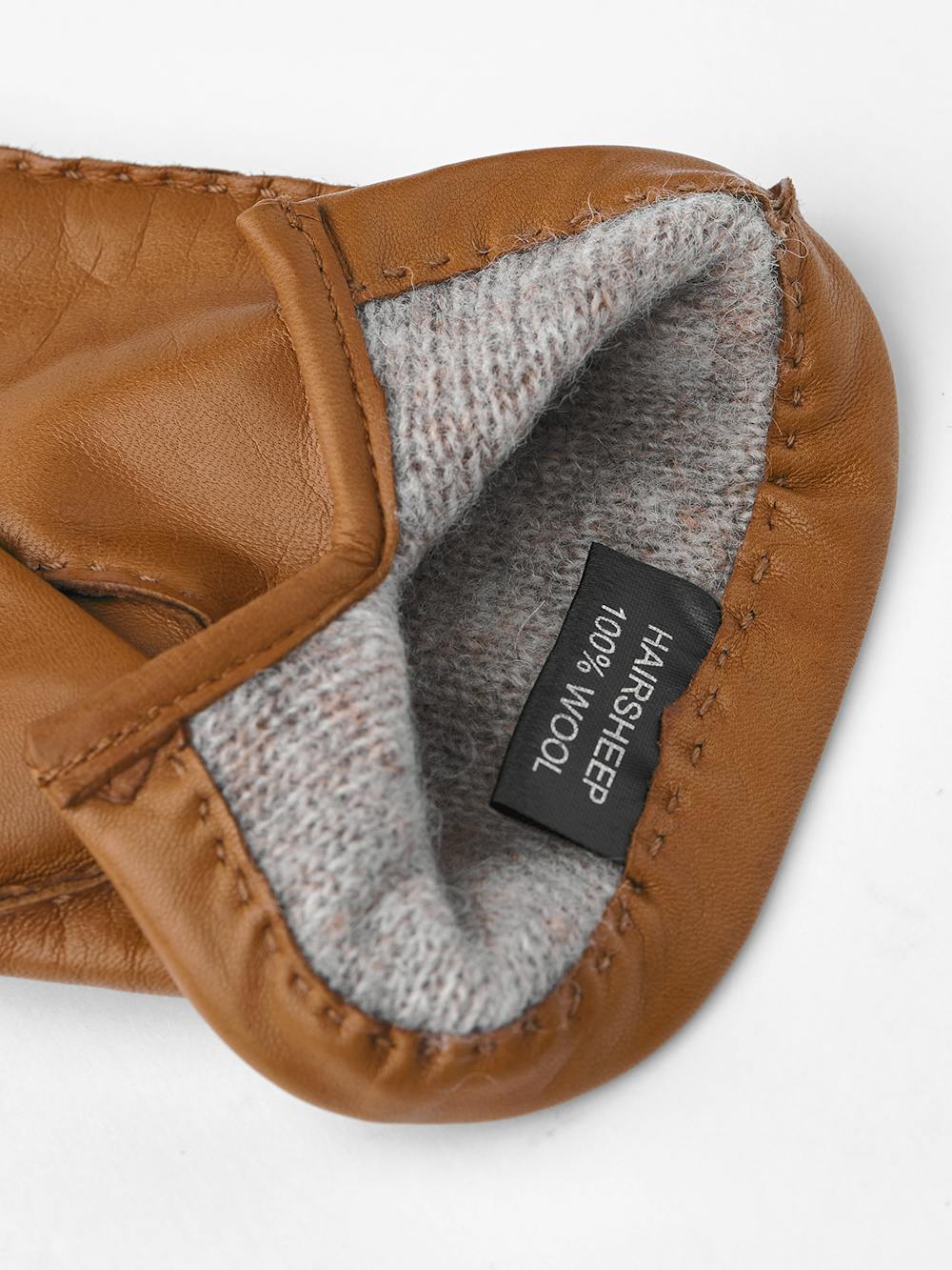 Goldbrauner handgenähter Lederhandschuh aus Haarschafleder
 (5 oder 5)