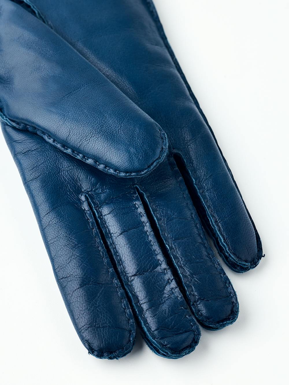 Midnight blue hand-sewn hairsheep leather glove
(2 of 6)
