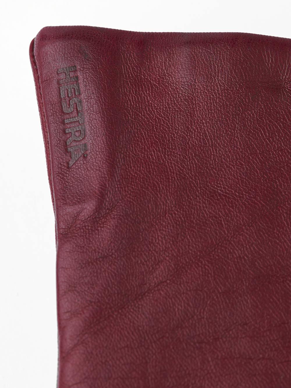 Dark red machine-sewn hairsheep leather glove
(2 of 4)