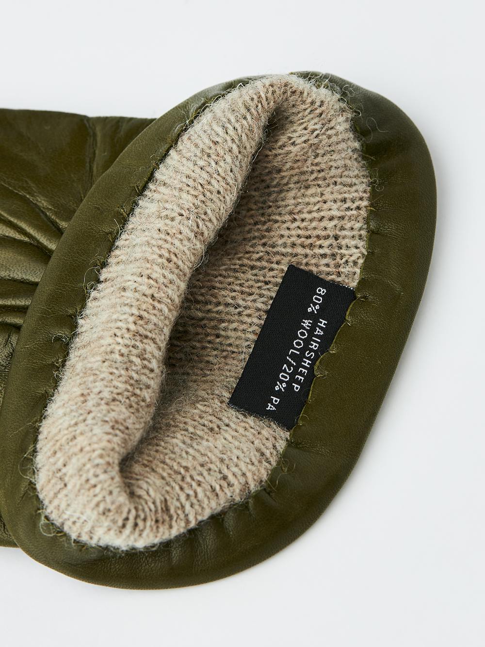 Moss green machine-sewn hairsheep leather glove
(3 of 3)