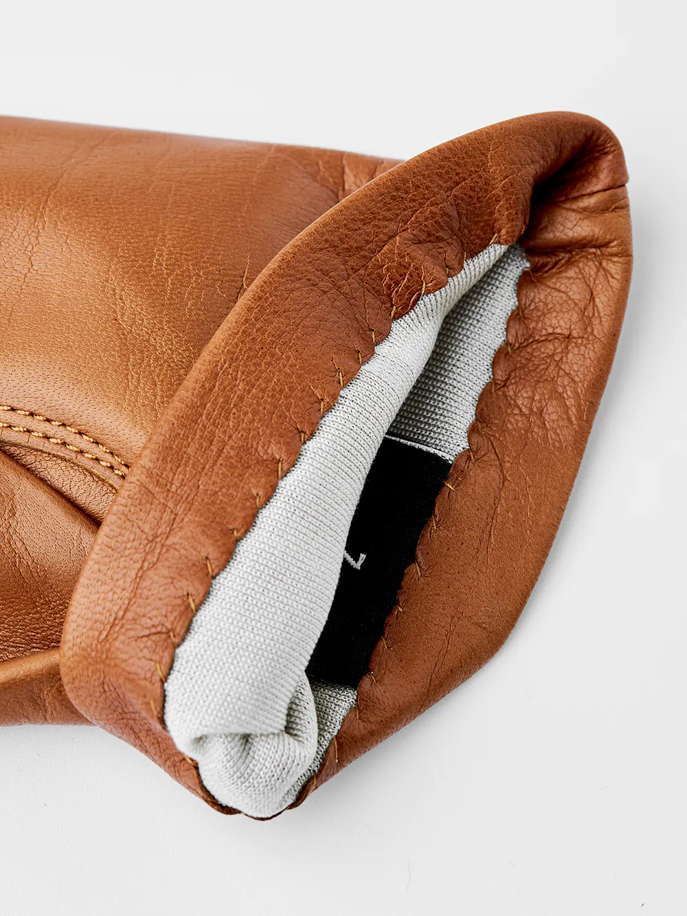 Light brownish-yellow machine-sewn hairsheep leather glove
(2 of 3)