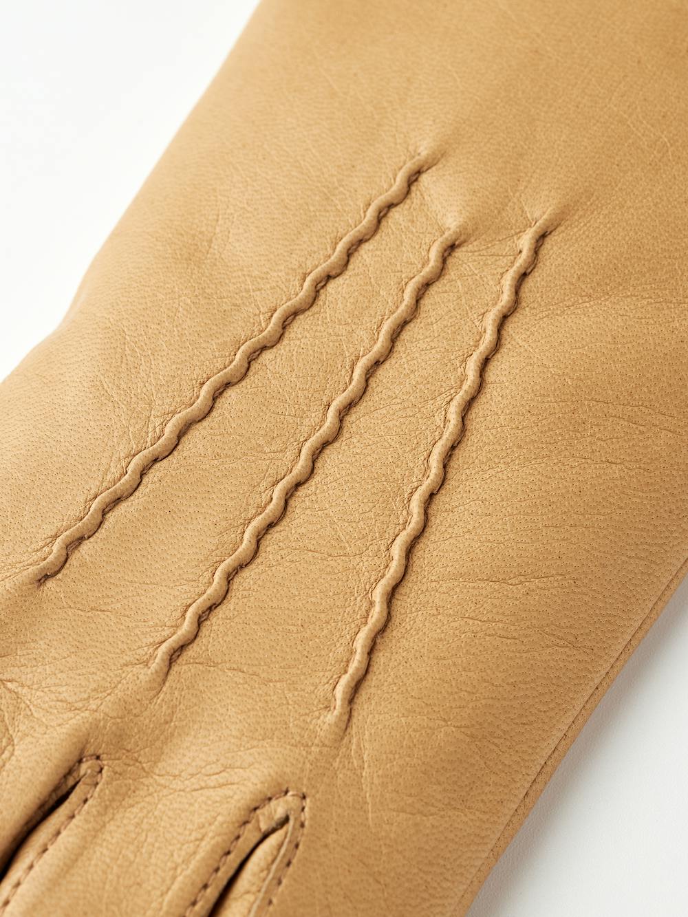 Mörkbeige maskinsydd skinnhandske i lammnappa
 (4 av 6)