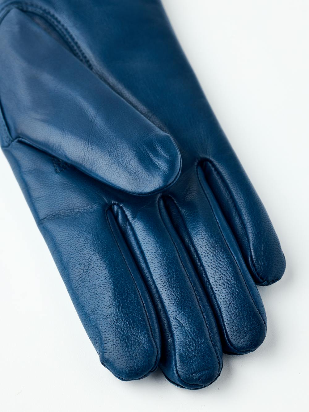 Midnight blue machine-sewn hairsheep leather glove
(2 of 6)