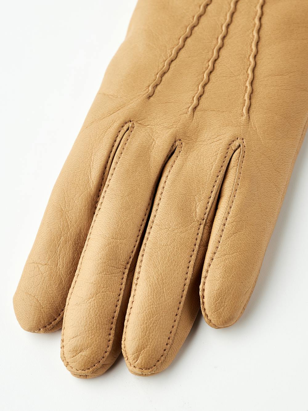 Mörkbeige maskinsydd skinnhandske i lammnappa
(2 av 6)