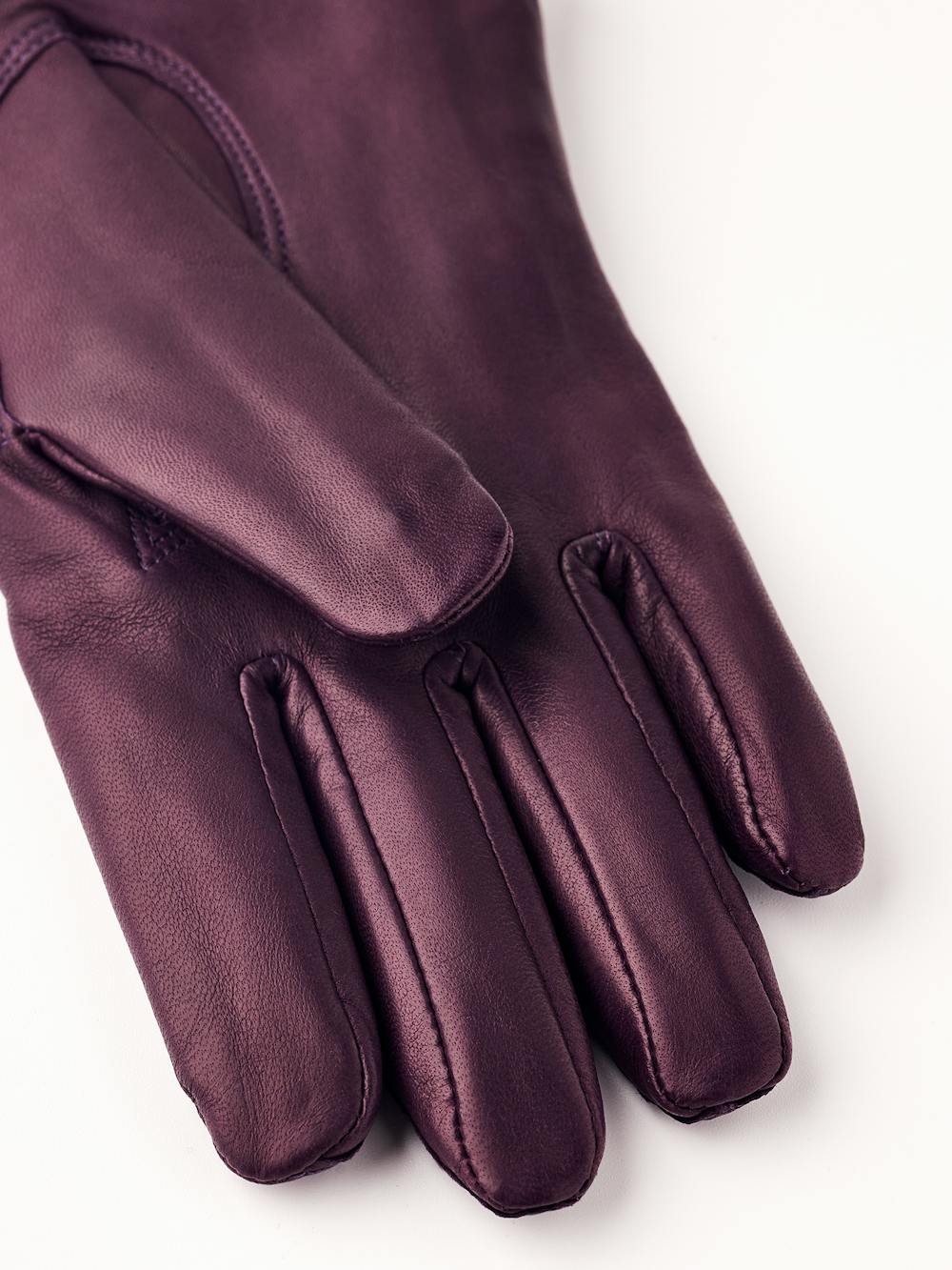 Dark purple machine-sewn hairsheep leather glove with knitted cuff
 (2 of 4)