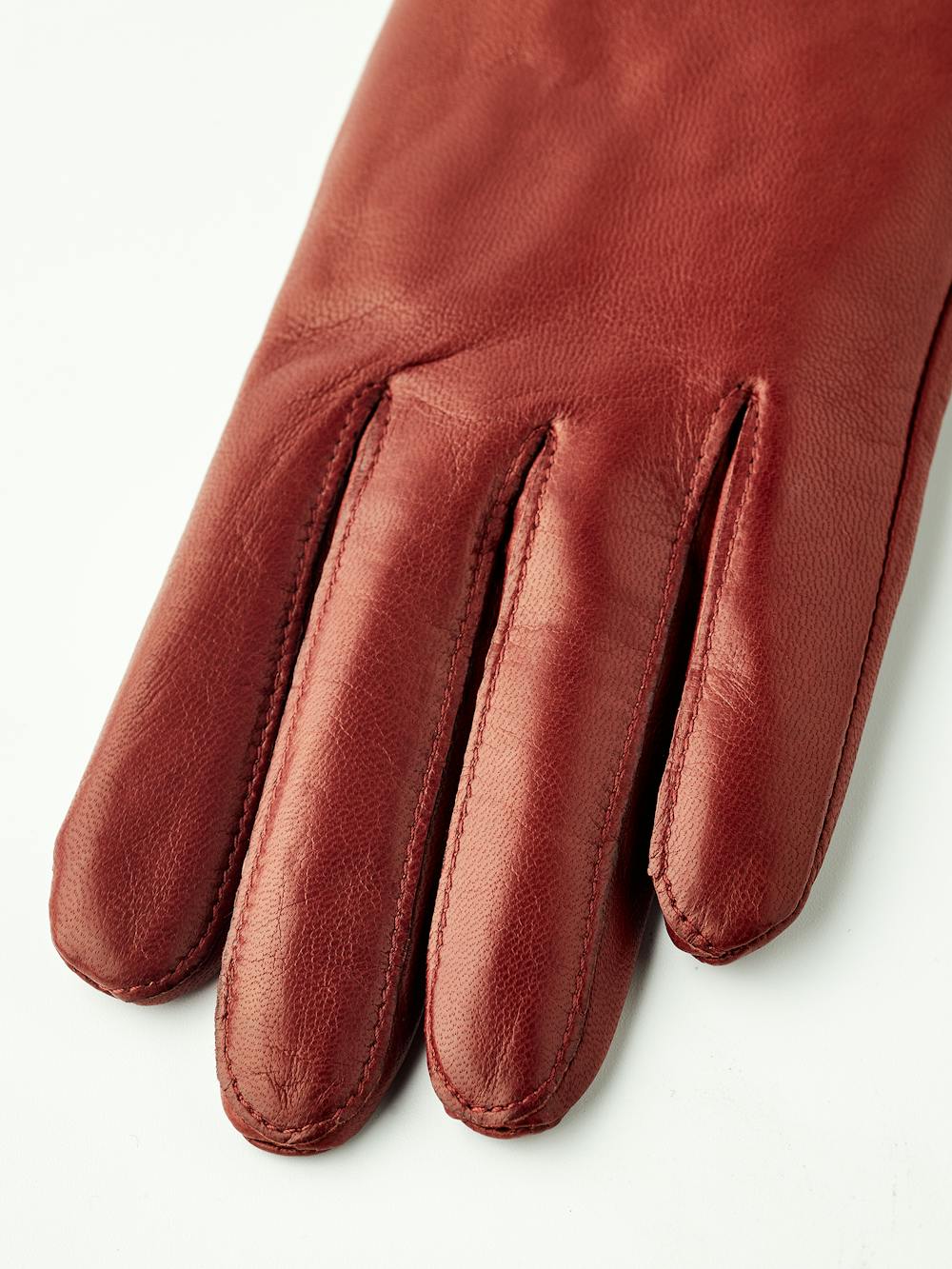 Brown-red machine-sewn hairsheep leather glove with knitted cuff
 (2 of 4)