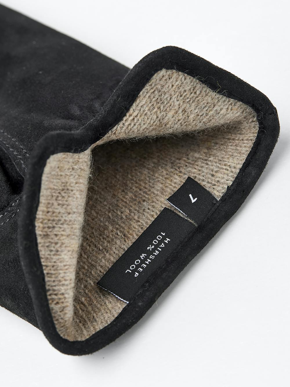 Black machine-sewn suede glove

 (2 of 5)