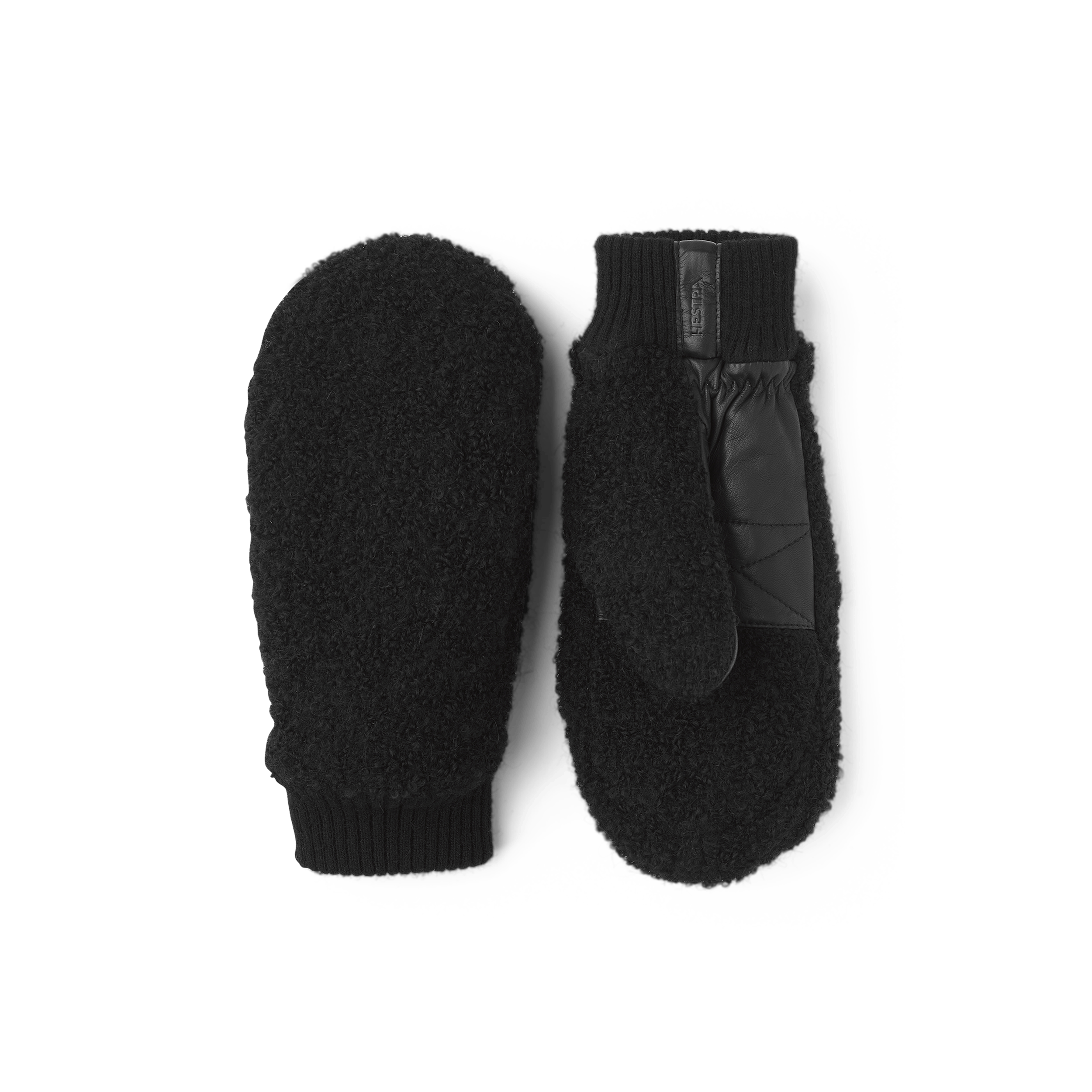 Svart tumhandske i teddyfleece med svart lammnappa i innerhanden
(1 av 5)