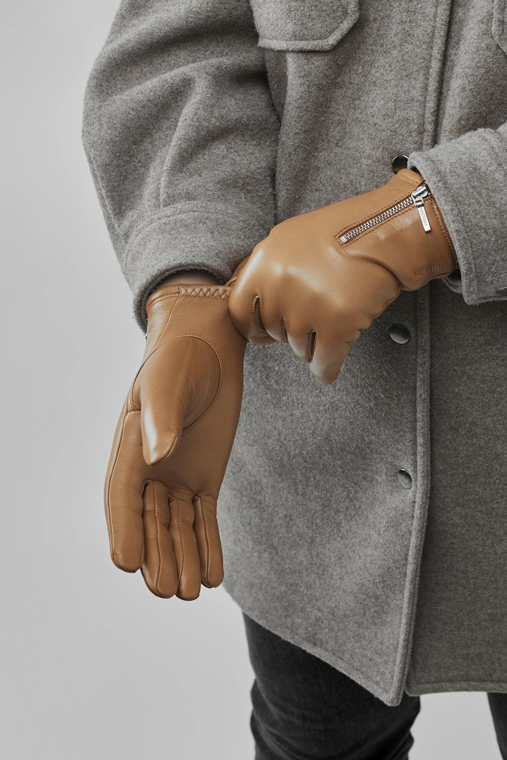 Light brownish-yellow machine-sewn hairsheep leather glove with zip
(5 of 5)