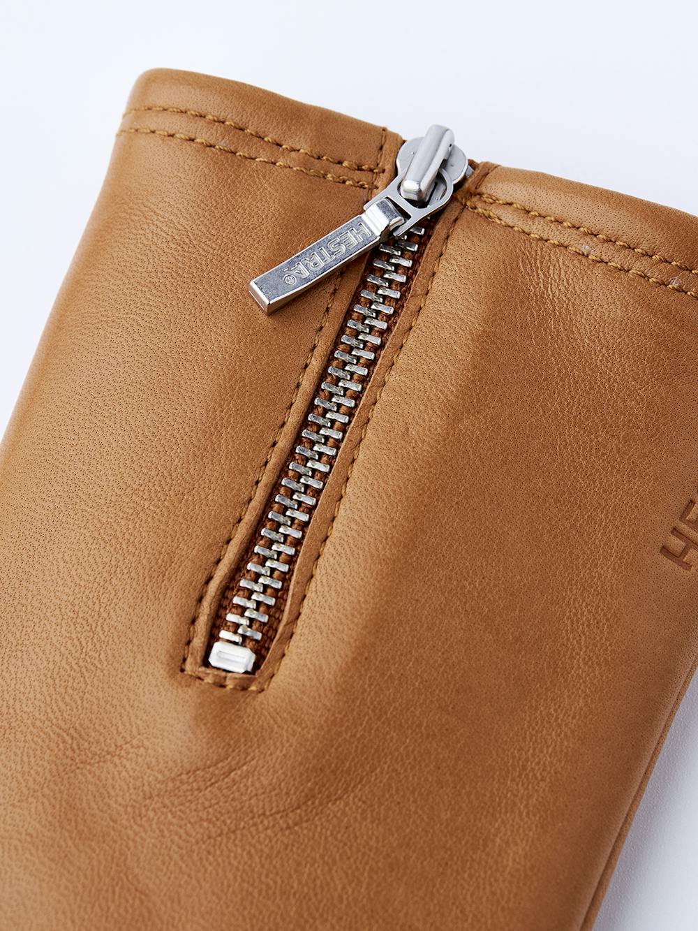 Light brownish-yellow machine-sewn hairsheep leather glove with zip
 (2 of 5)