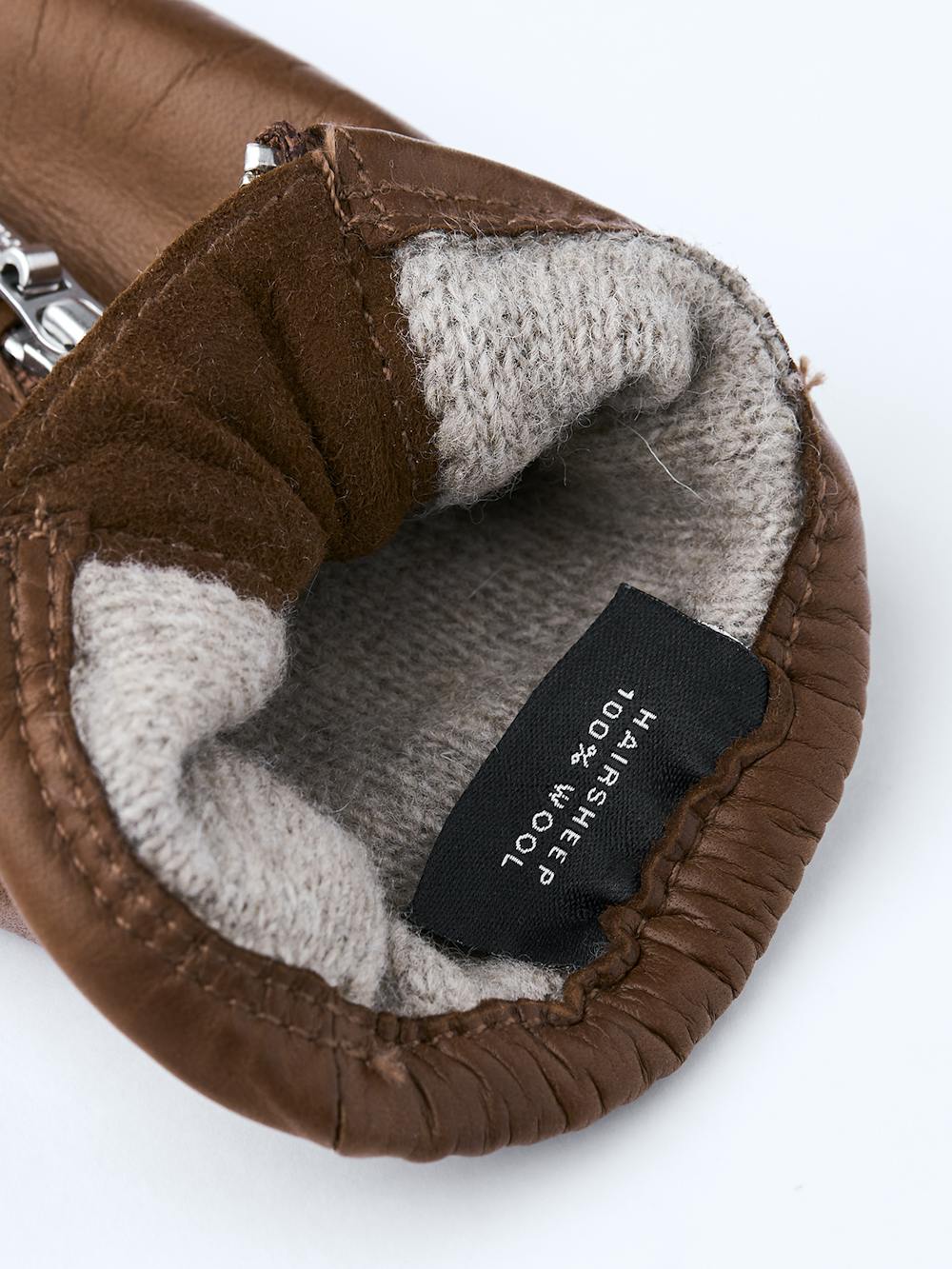 Mittelbrauner maschinengenähter Lederhandschuh aus Haarschafleder mit Reißverschluss
 (4 oder 4)