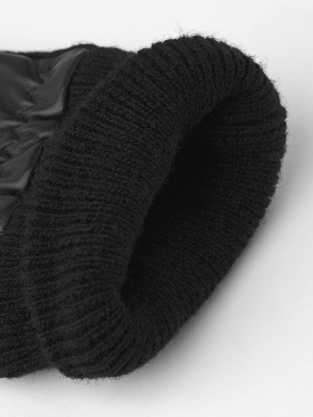 Svart maskinsydd skinnhandske i lammnappa med stickad mudd och sidor
(4 av 4)