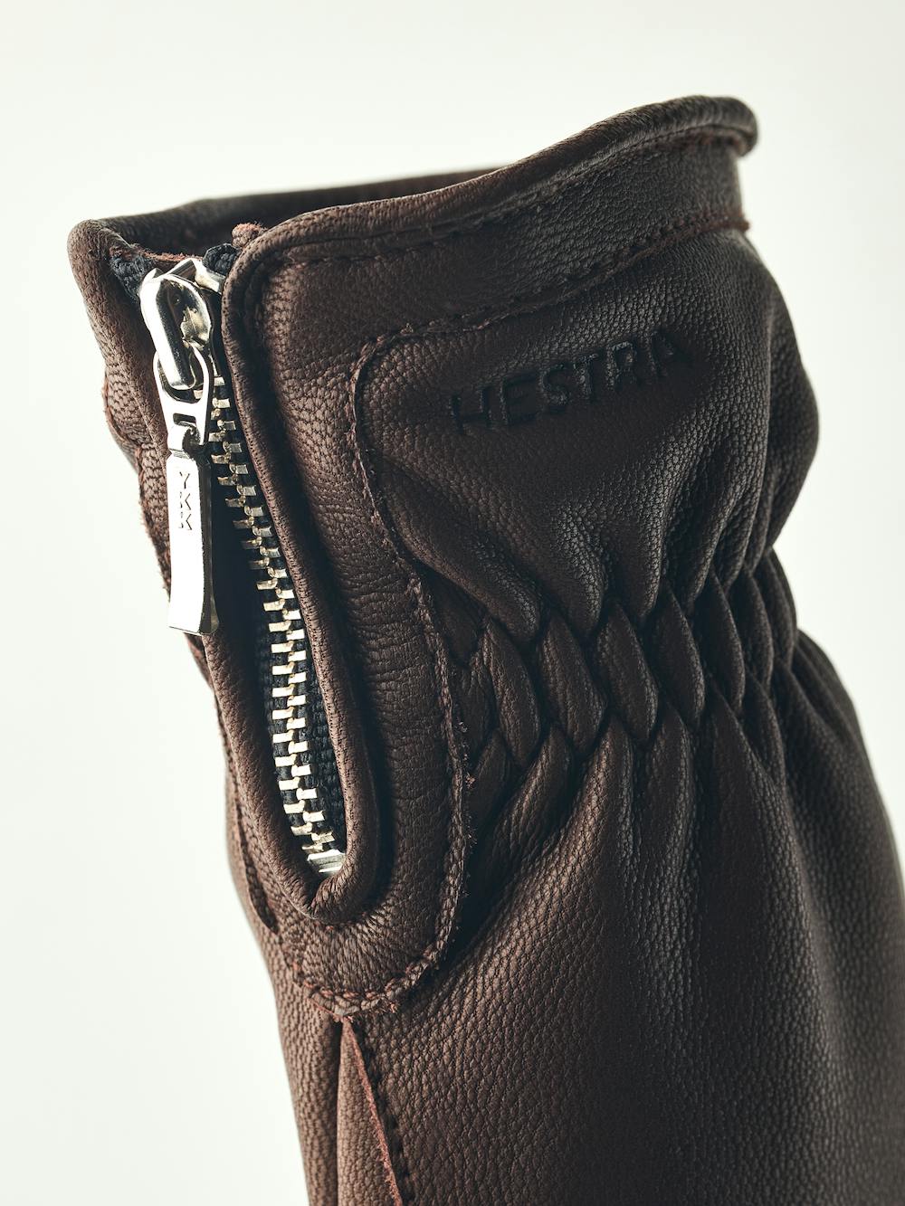 Dark brown machine-sewn goat leather glove with zip
(5 of 5)