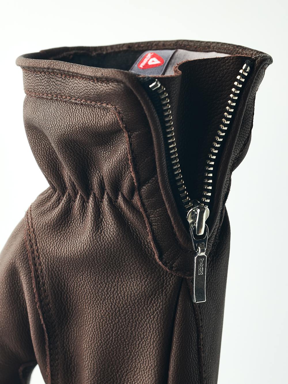 Dark brown machine-sewn goat leather glove with zip
(4 of 5)