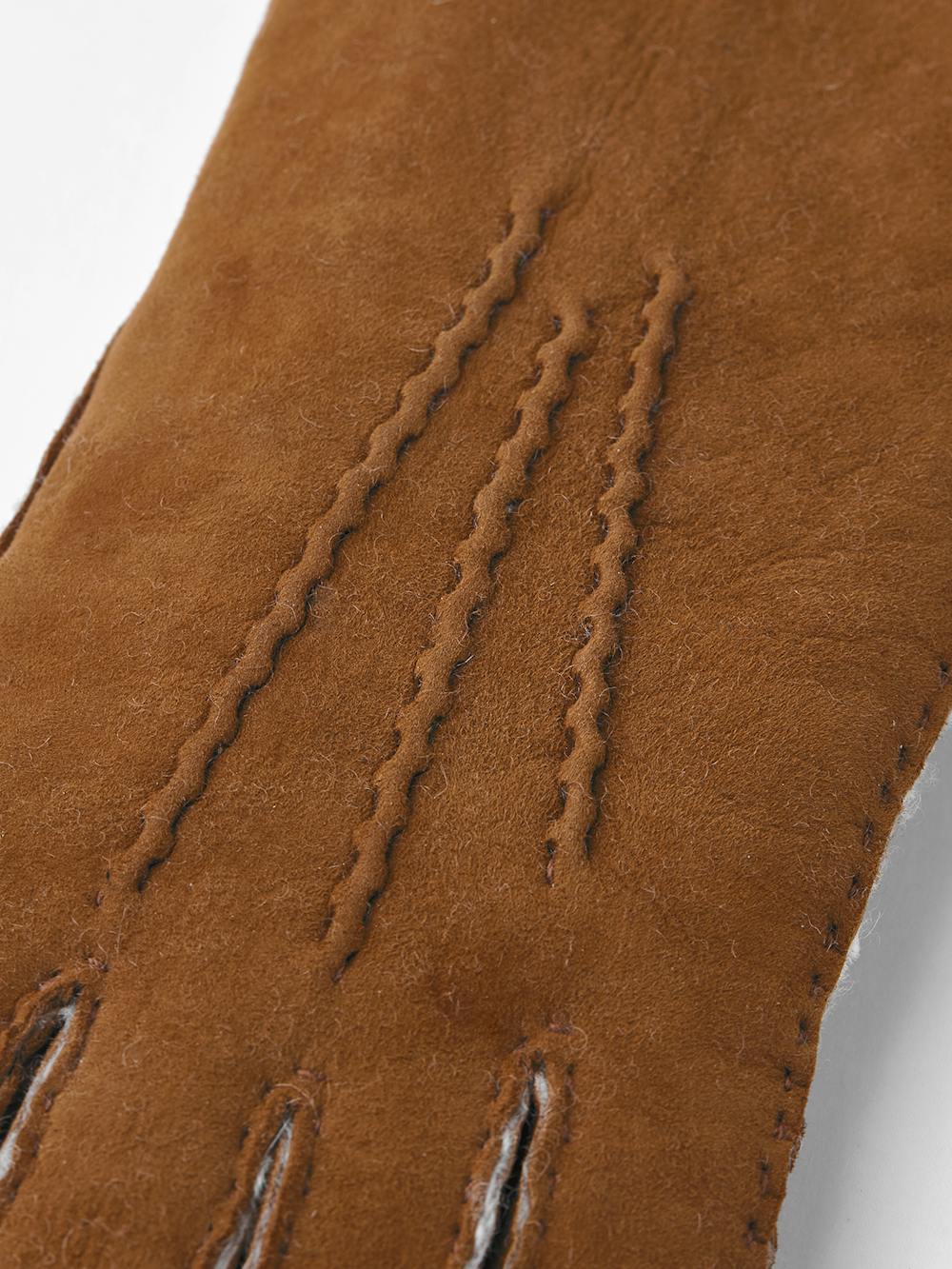 Light brownish-yellow hand-sewn fur suede glove
 (2 of 3)