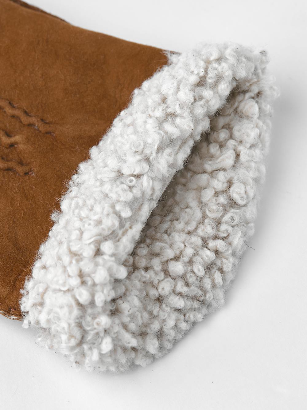 Light brownish-yellow hand-sewn fur suede glove
(3 of 3)