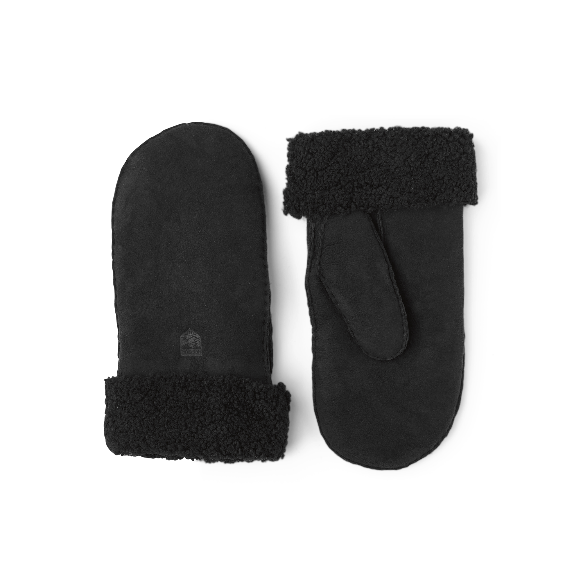 Svart tumhandske i pälsmocka med nedvikt pälskant
(1 av 2)