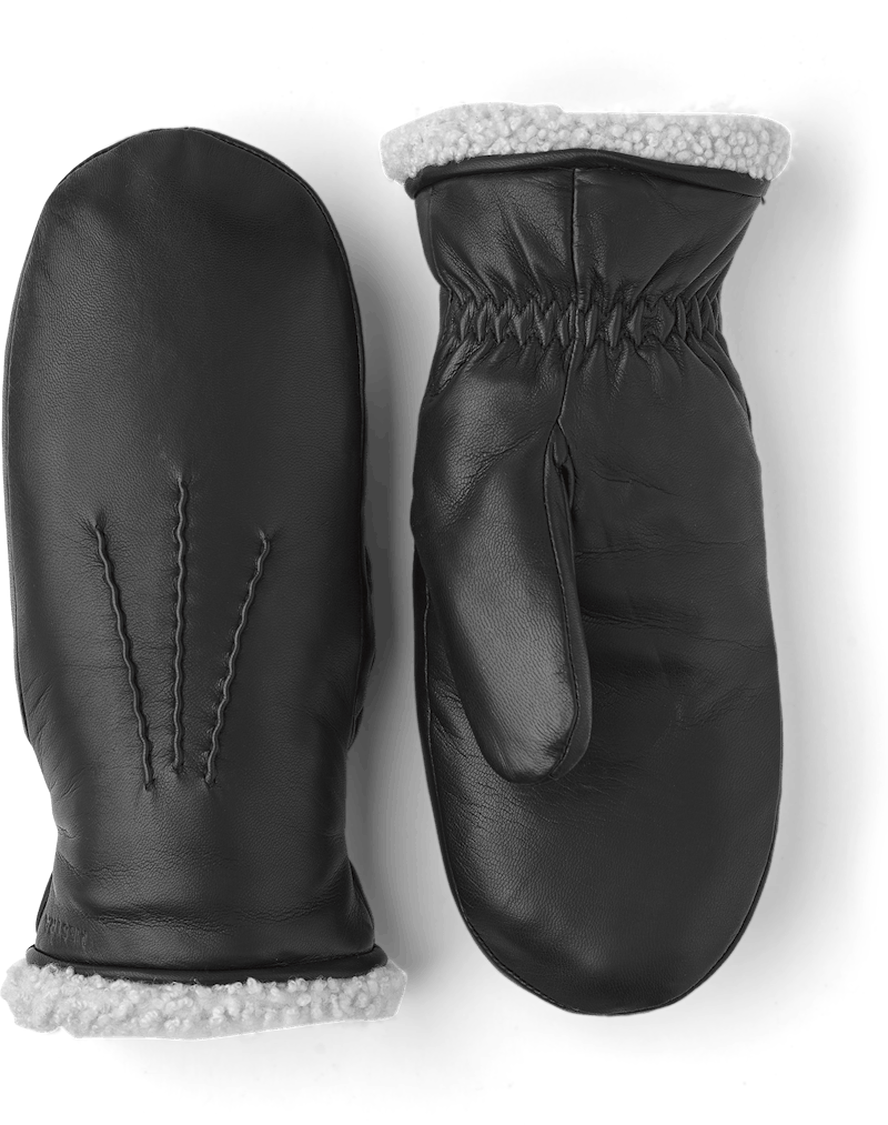Black machine-sewn hairsheep leather mitten with white fur trim
 (1 of 5)