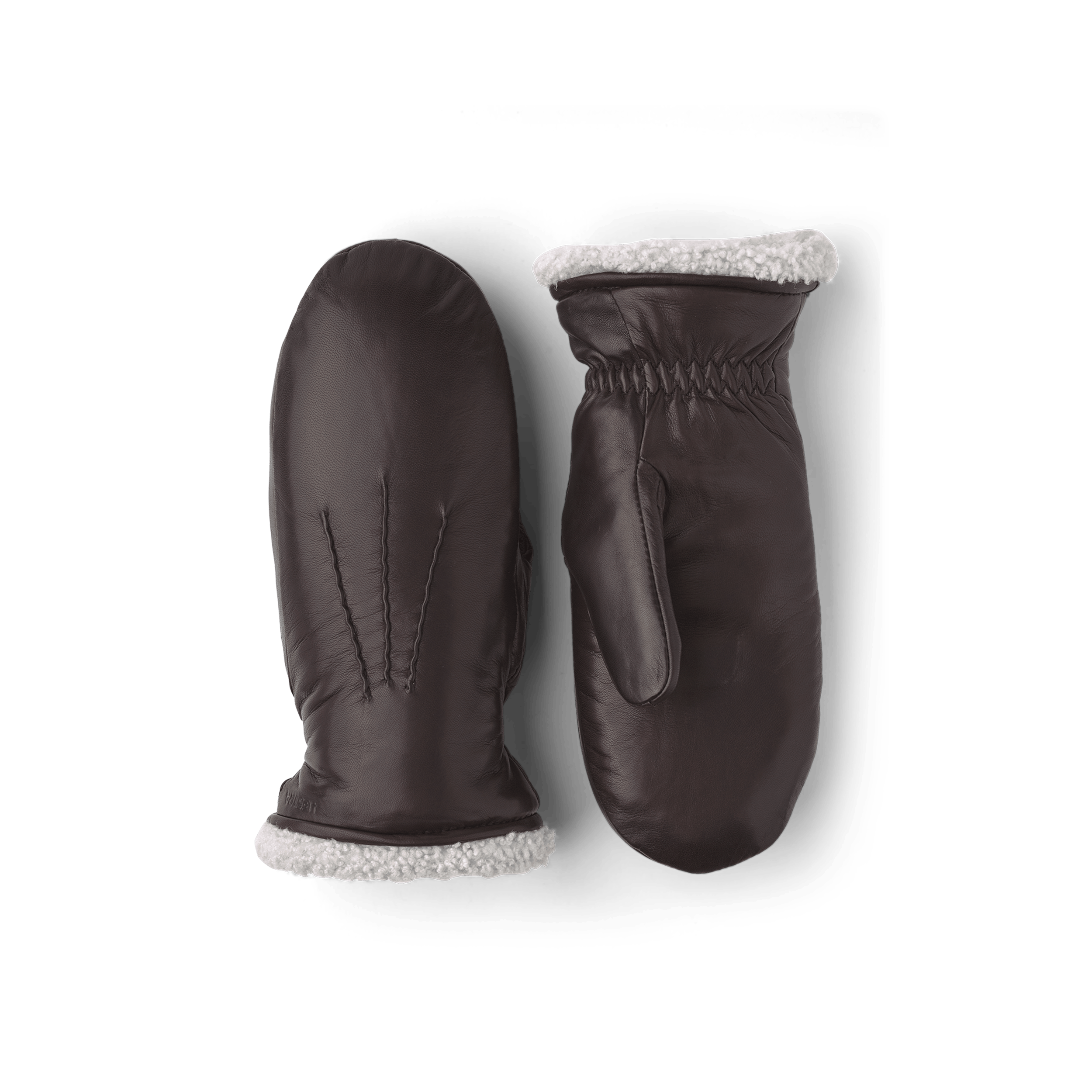 Dark brown machine-sewn hairsheep leather mitten with white fur trim
(1 of 5)