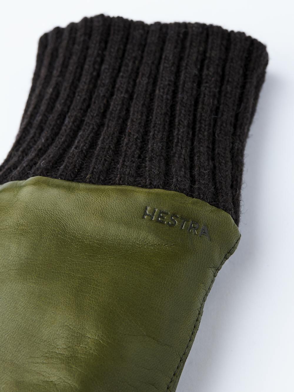 Moss green machine-sewn hairsheep leather mitten with brown knitted cuff
 (2 of 3)