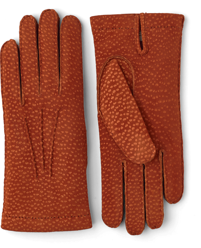 Brick red hand-sewn glove in carpincho nubuck
 (1 of 4)