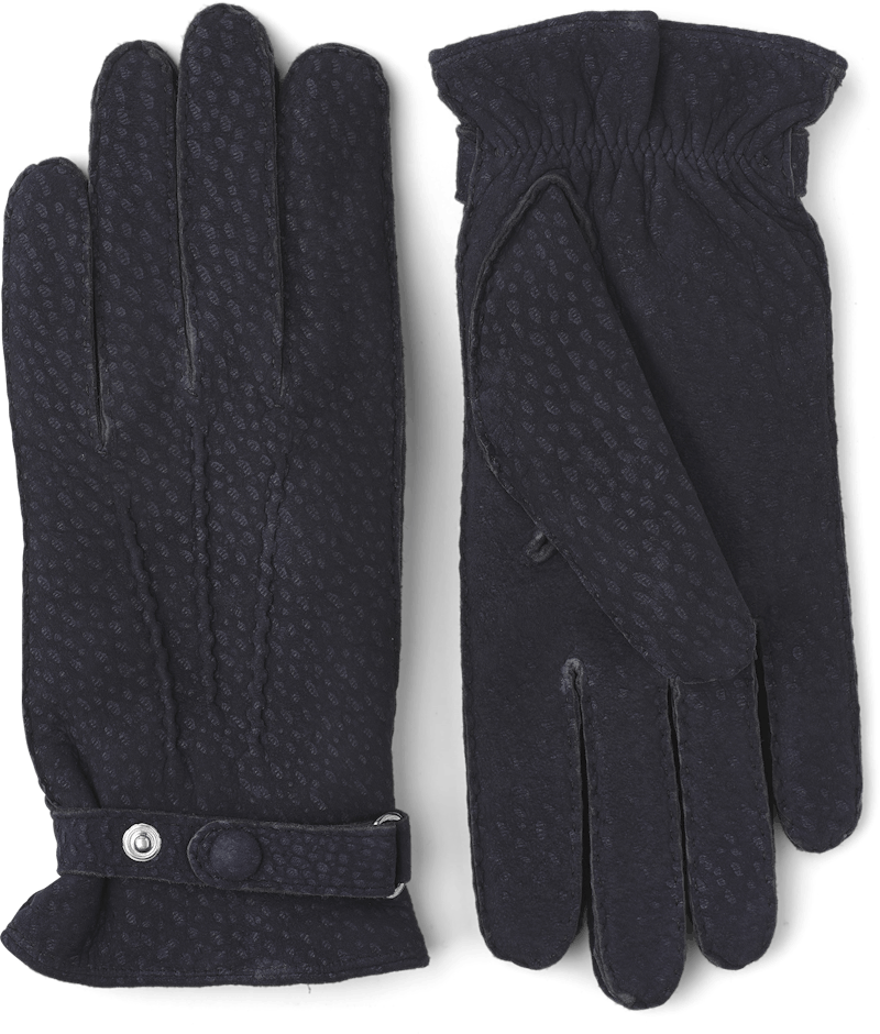 Dark blue hand-sewn glove in carpincho nubuck with leather strap and button
 (1 of 4)