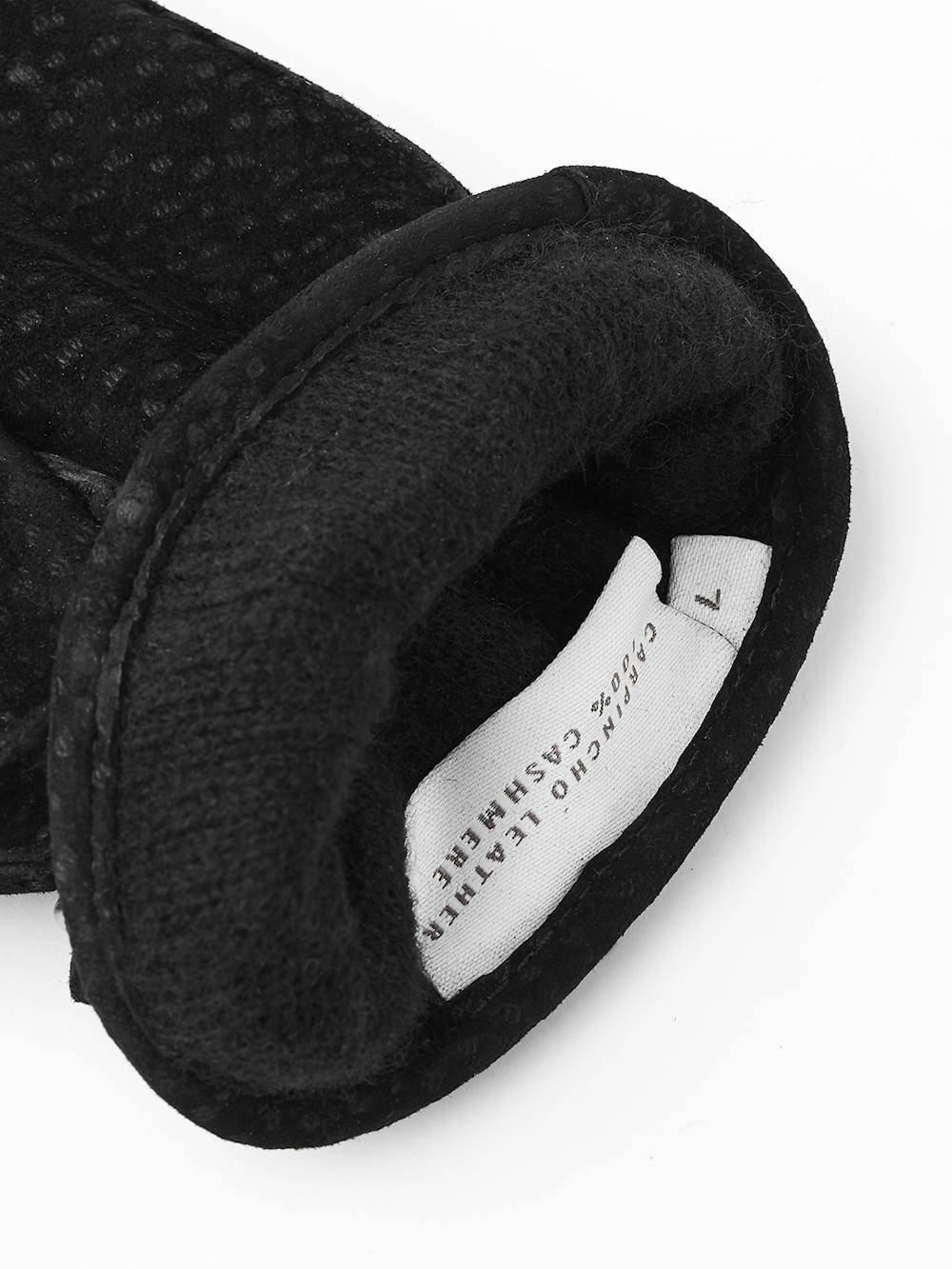 Schwarzer handgenähter Handschuh aus Carpincho-Nubuk mit Lederriegel und Knopf
(4 oder 4)