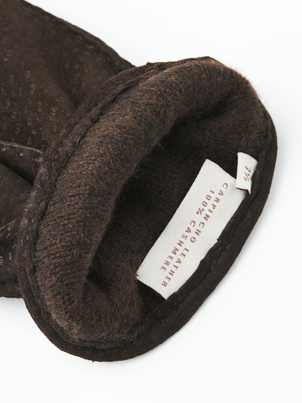 Dark brown hand-sewn glove in carpincho nubuck with leather strap and button
(4 of 4)