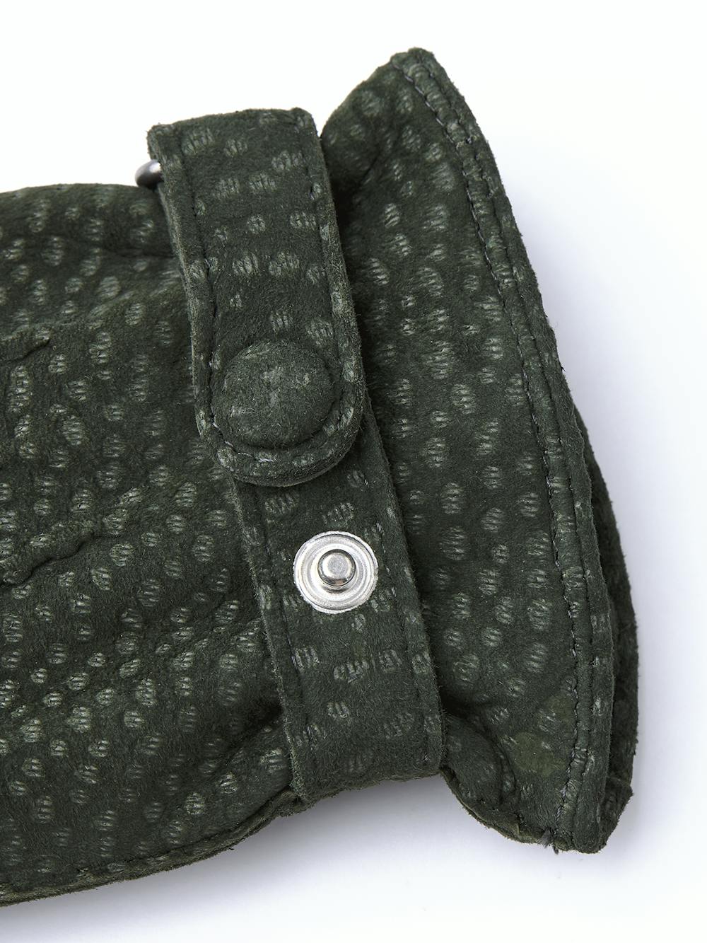 Dark green hand-sewn glove in carpincho nubuck with leather strap and button
 (3 of 4)