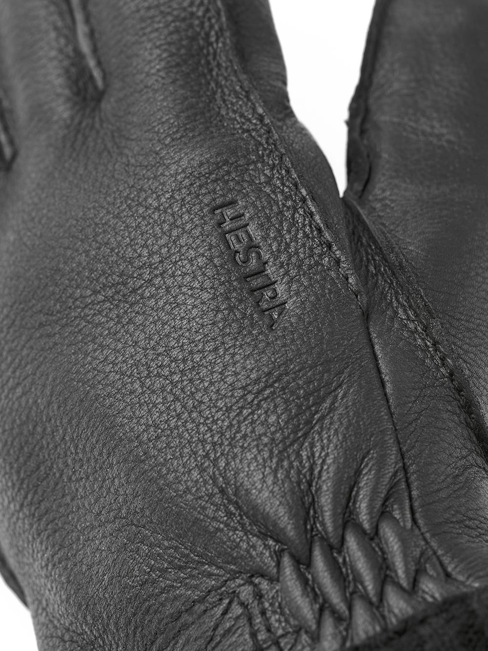 Black machine-sewn deerskin glove with knitted cuff
(2 of 3)