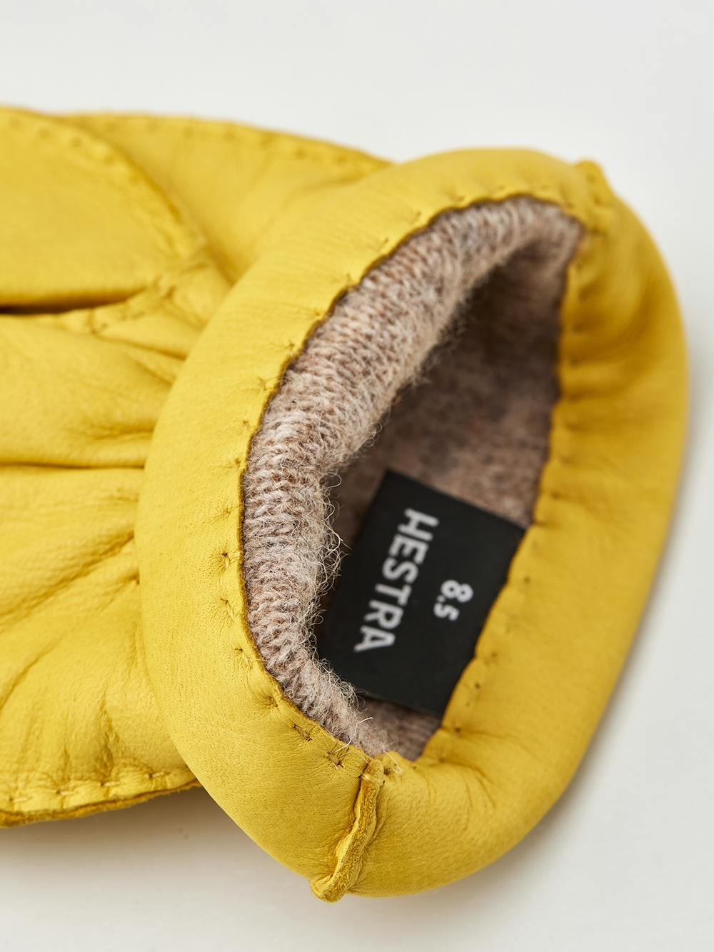 Yellow hand-sewn deerskin glove
 (2 of 4)